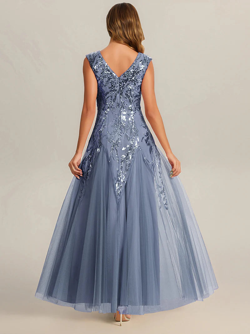 Dusty blue sequin and tulle mother of the bride dress with short sleeve.