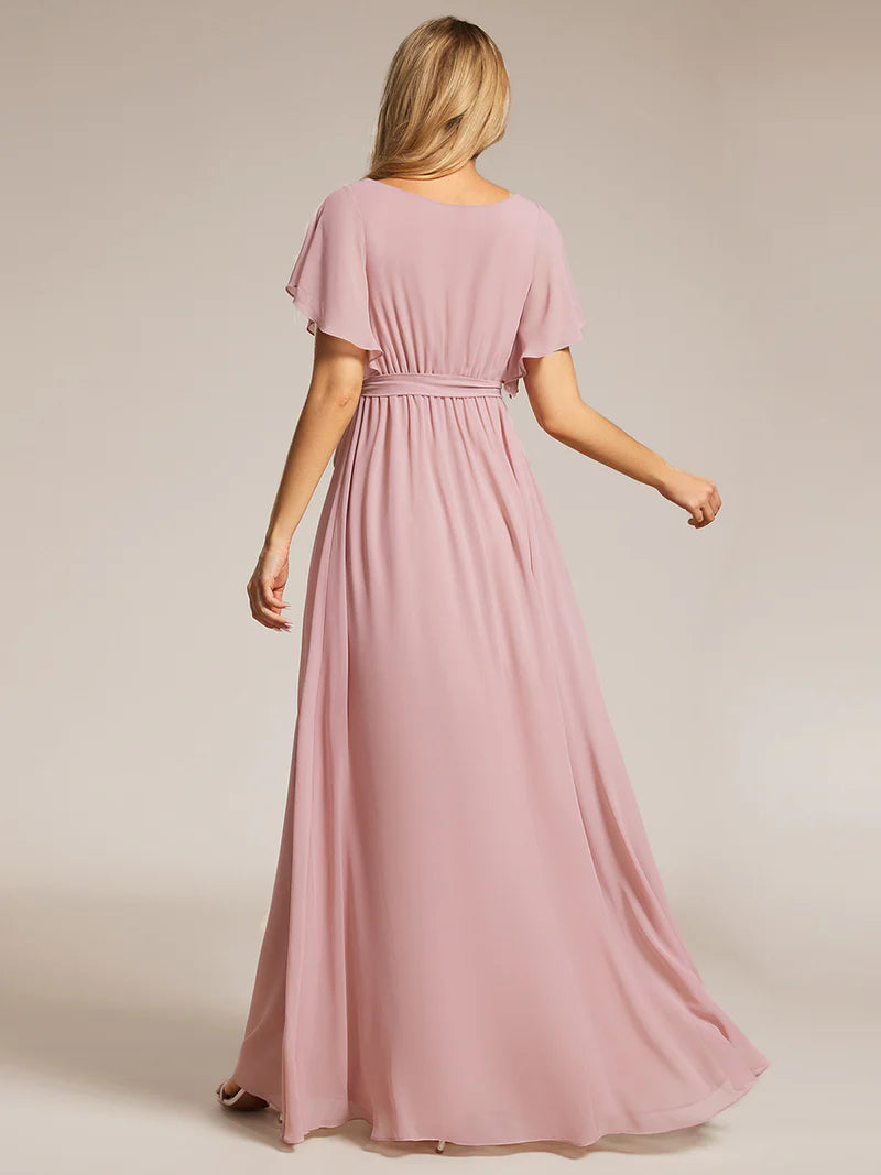 Dusty rose bridesmaid dress with v-neck and a-line.