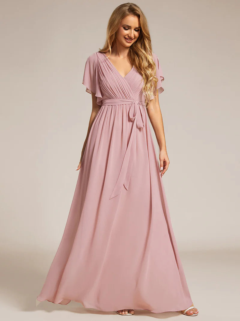Dusty rose bridesmaid dress with v-neck and a-line.