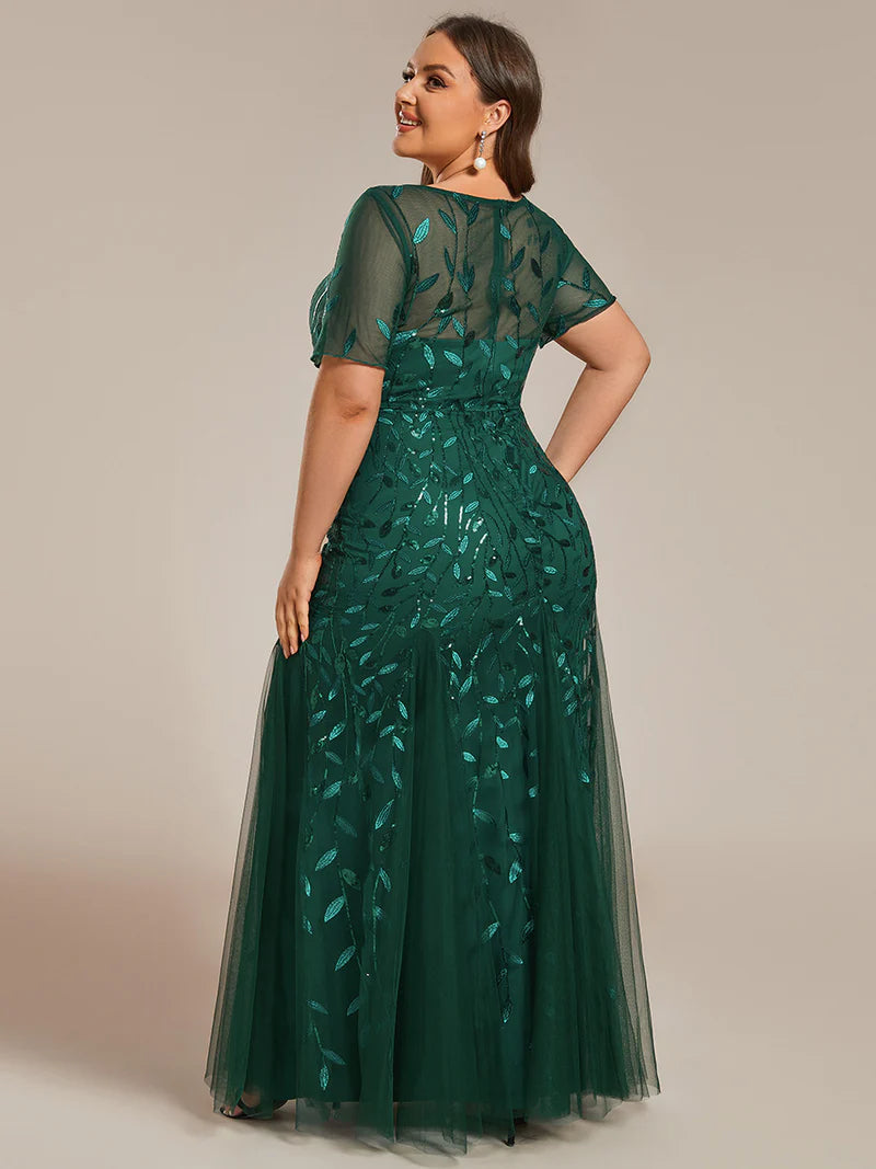 Emerald green Plus Size Mother of the bride or formal dress, short sleeve with tulle, lace and sequin detailing.