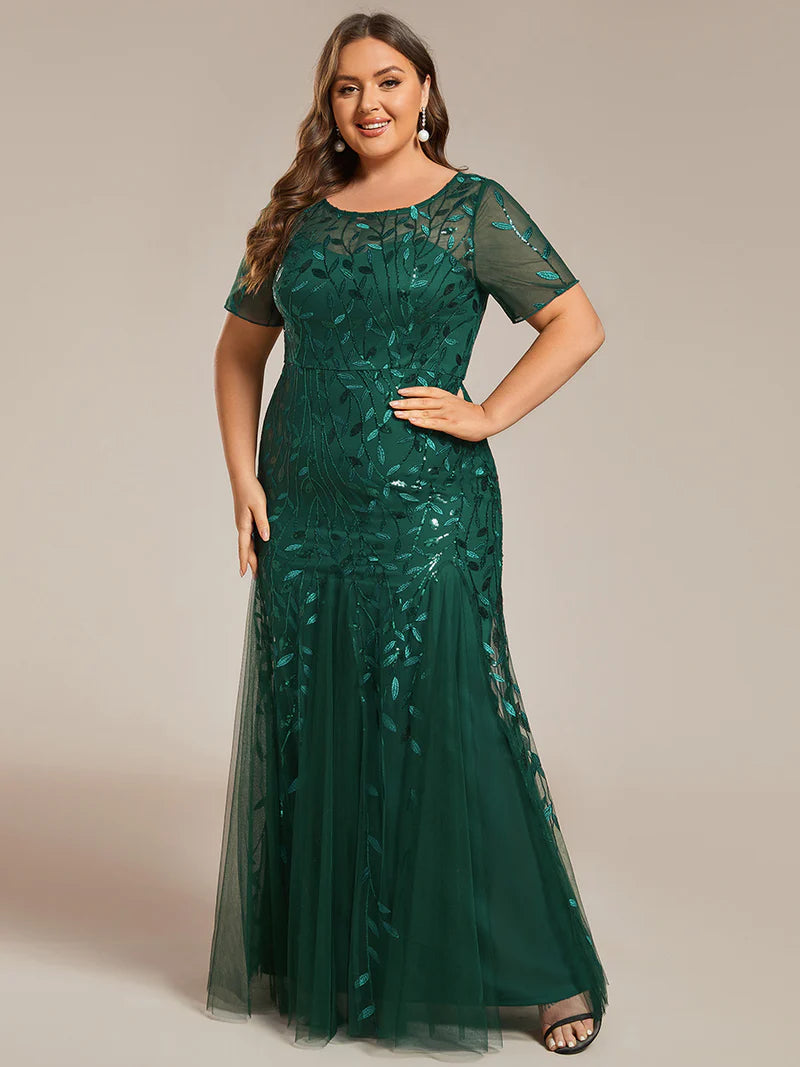 Emerald green Plus Size Mother of the bride or formal dress, short sleeve with tulle, lace and sequin detailing.