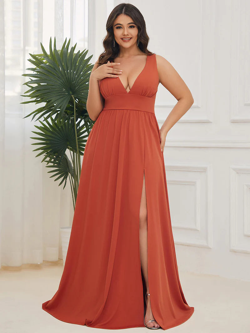 Burnt orange plus sized sleeveless formal dress with deep v neck and front split.