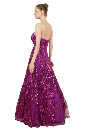 Fushia strapless formal or evening dress with lace sequin overlay by Miss Anne.