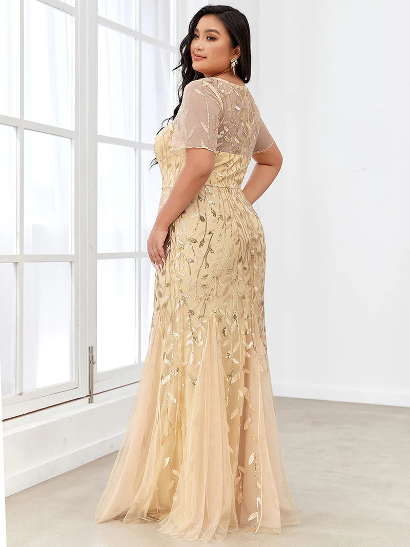 Gold champagne Plus Size Mother of the bride or formal dress, short sleeve with tulle, lace and sequin detailing.