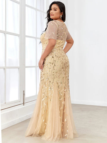 Gold champagne Plus Size Mother of the bride or formal dress, short sleeve with tulle, lace and sequin detailing.