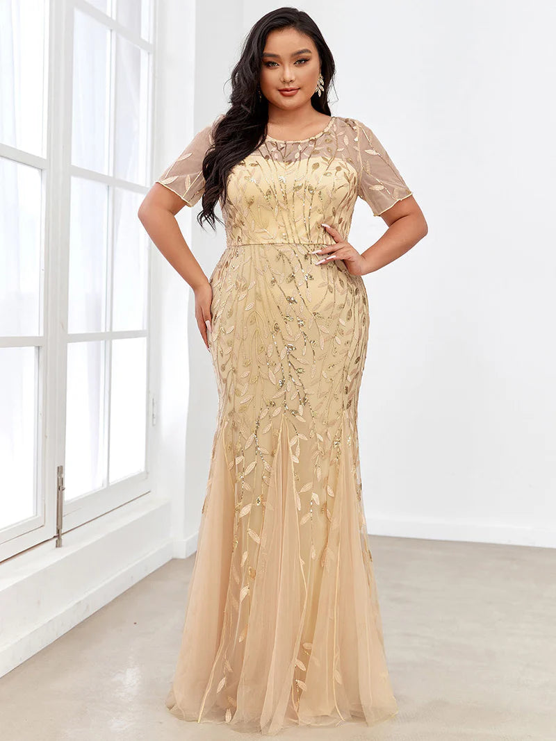 Gold champagne Plus Size Mother of the bride or formal dress, short sleeve with tulle, lace and sequin detailing.