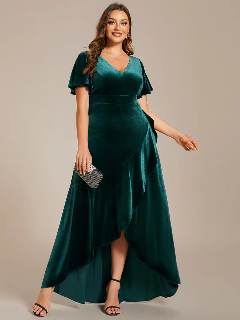 Green velvet plus size formal dress with asymetric hem.