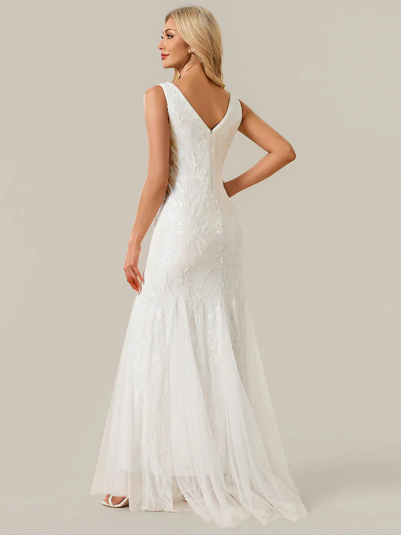 Ivory wedding dress sheath style with sequins and tulle.