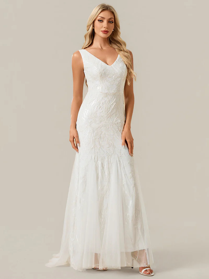 Ivory wedding dress sheath style with sequins and tulle.