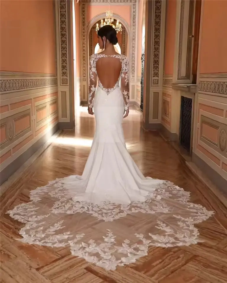 Long lace sleeve satin wedding dress with lace train, plus size available.