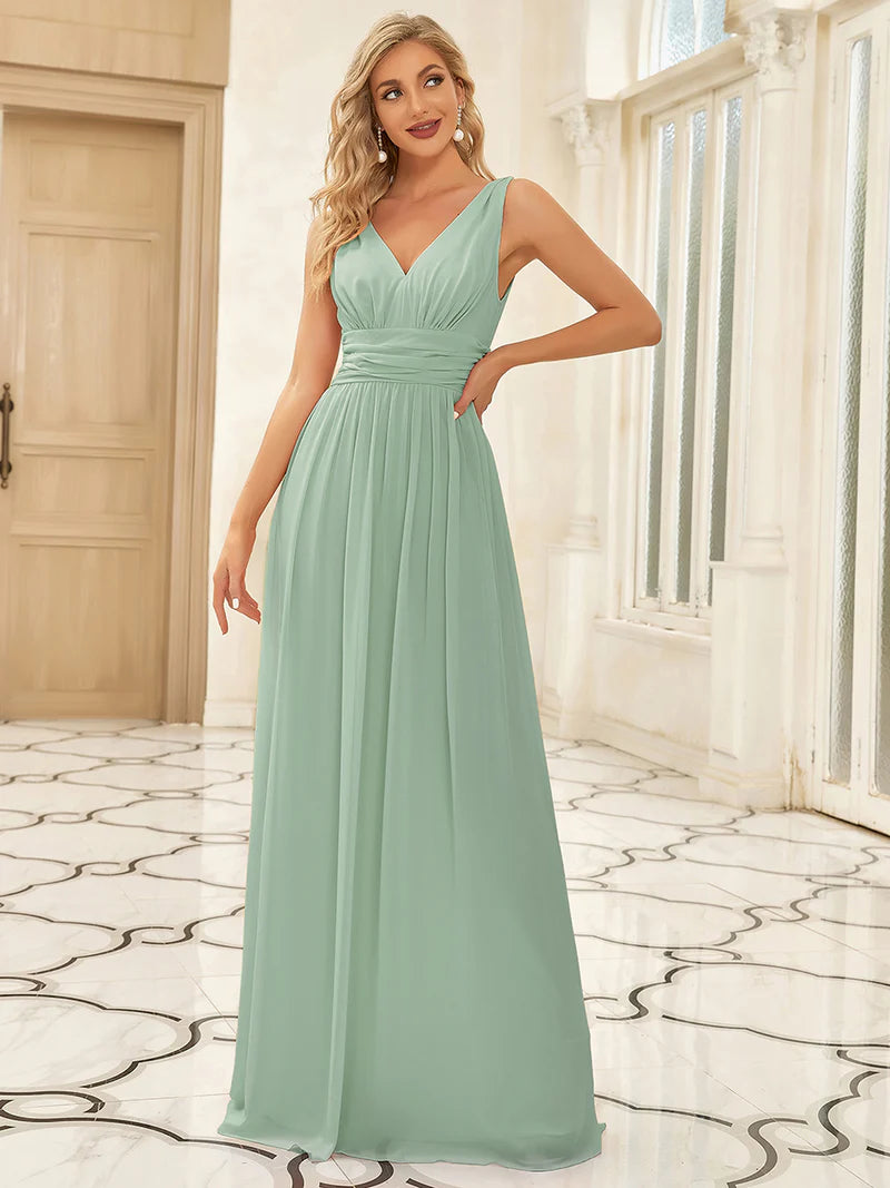 Mint green bridesmaid dress with double v-neck and chiffon.