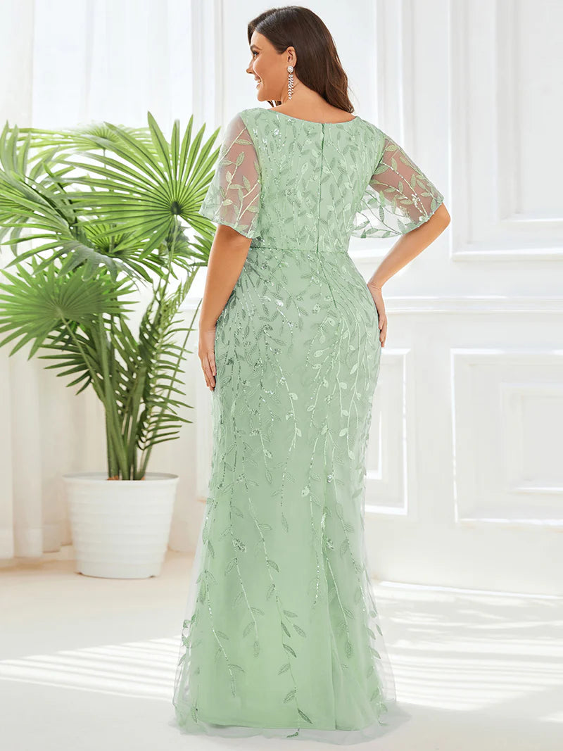Mint Green Plus Size Mother of the bride dress with tulle, sequins and lace ruffle sleeves.