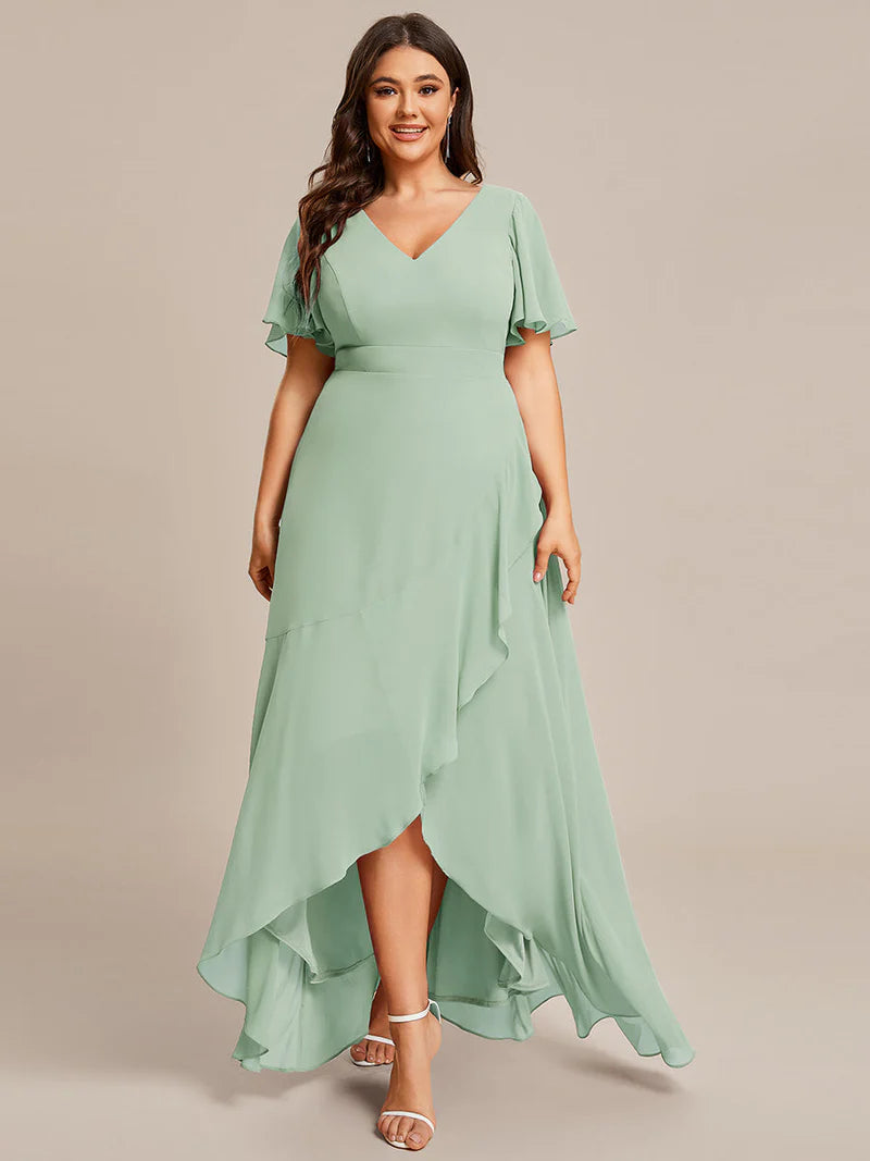 Mint green plus sized bridesmaid dress with high low ruffle and chiffon.