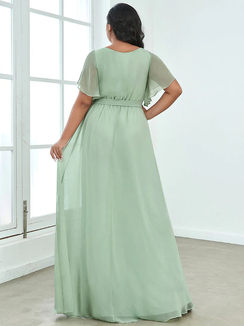 Mint green plus sized bridesmaid dress with v-neck and a-line.