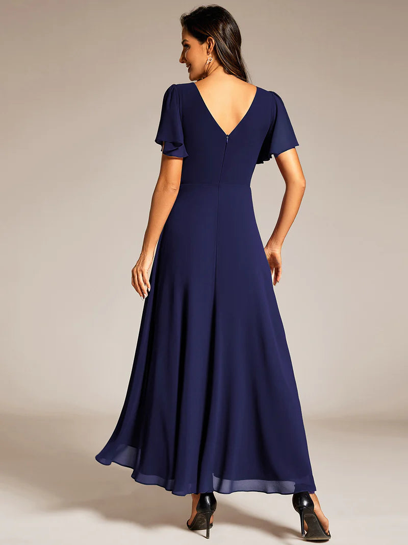 Navy Blue A-line mother of the bride dress with a sequin band detail and short sleeves.