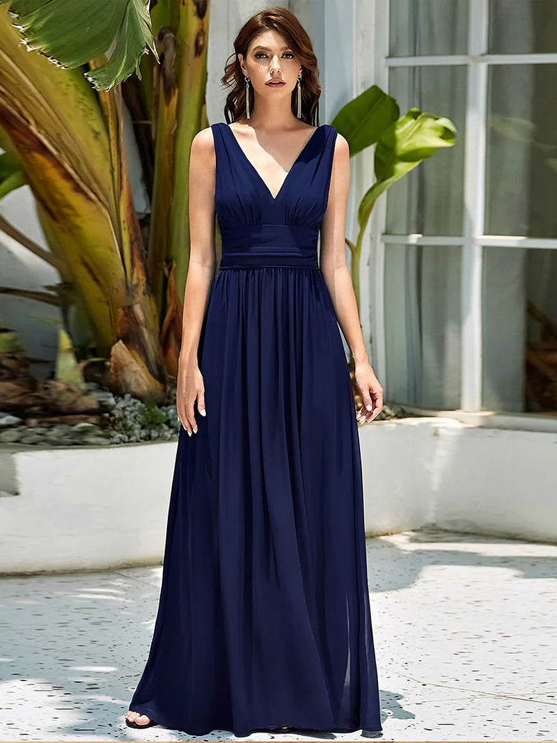 Navy blue bridesmaid dress with double v-neck and chiffon.