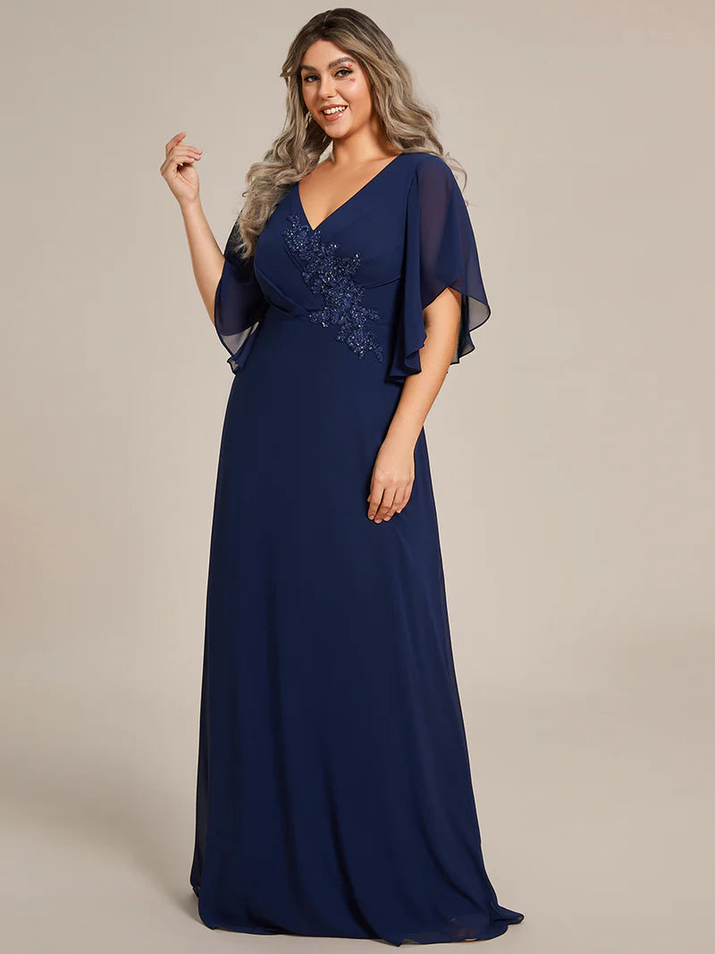 Navy blue embroidered mother of the bride or bridesmaid chiffon sleeve dress.