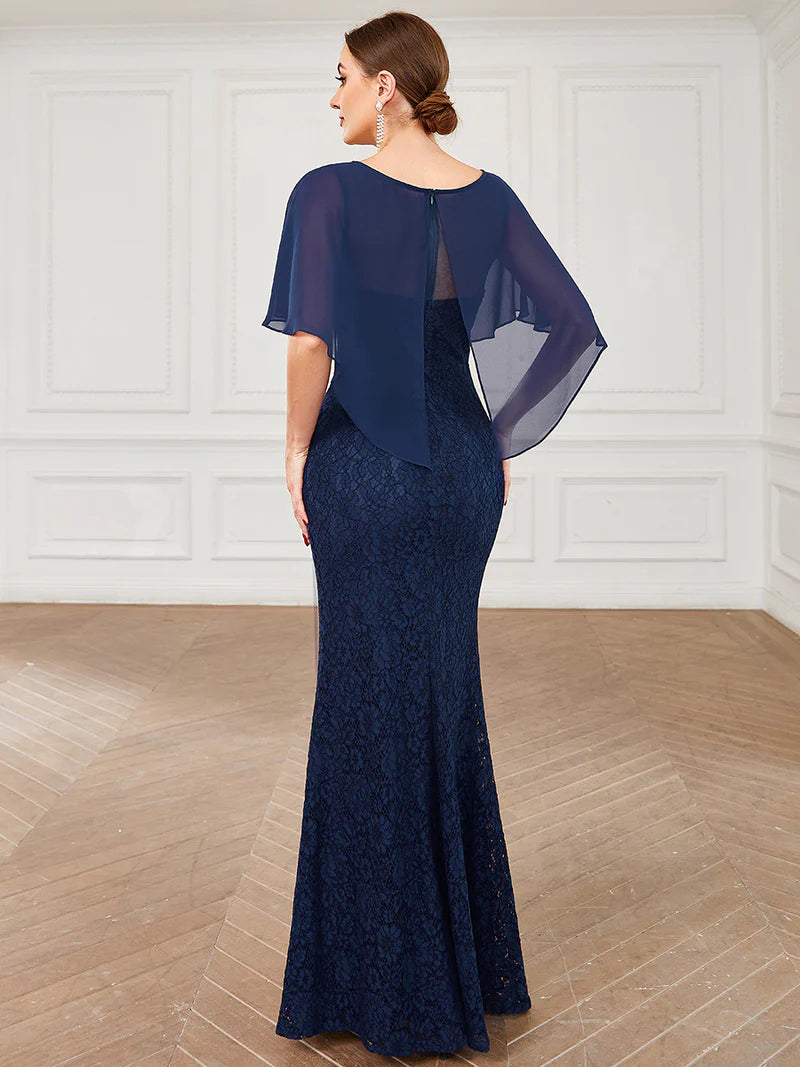 Navy blue Mother of the Bride dress with fishtail finish, lace with chiffon cape ruffle sleeves. Graceful Elegance bridal shop services Logan, Brisbane, Gold Coast, Scenic Rim.