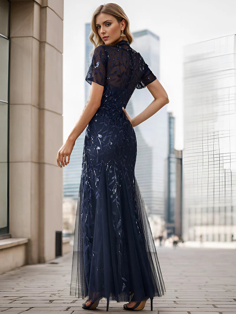 Navy blue Mother of the bride or formal dress, short sleeve with tulle, lace and sequin detailing.