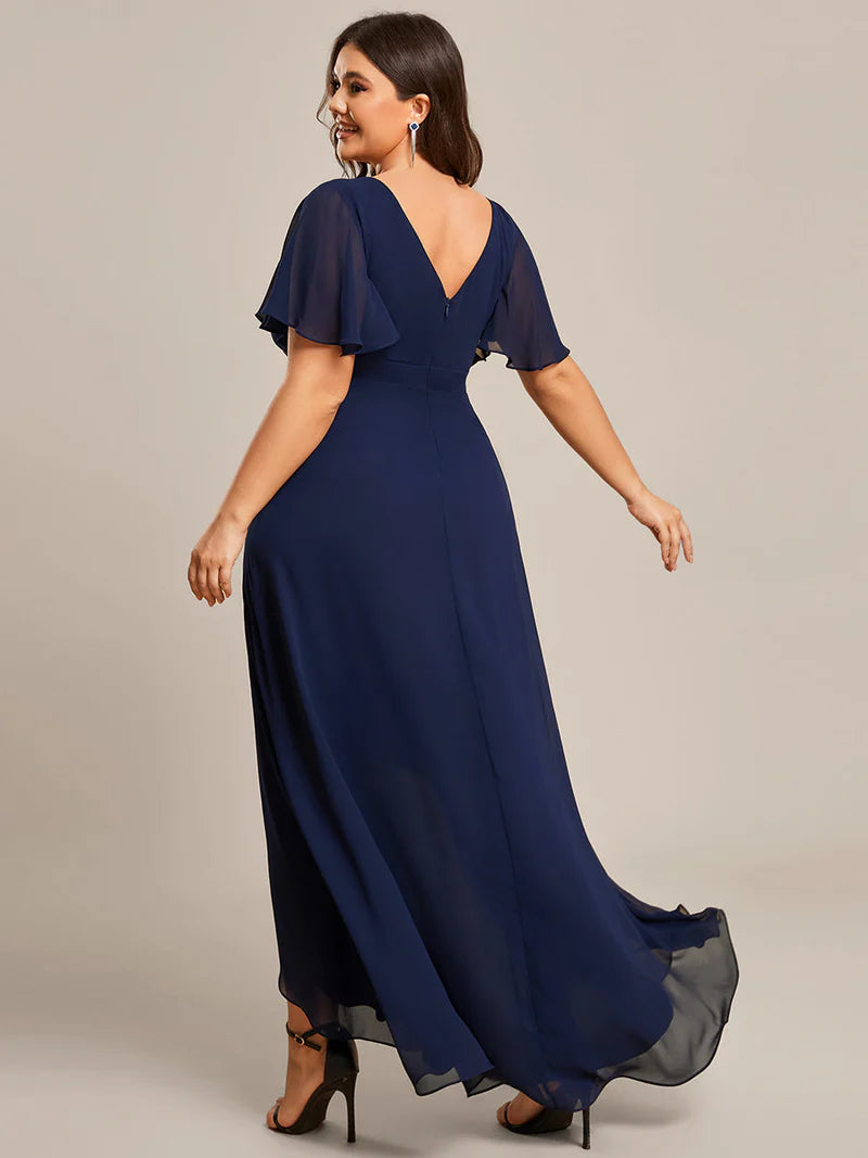 Navy blue plus sized bridesmaid dress with high low ruffle and chiffon.