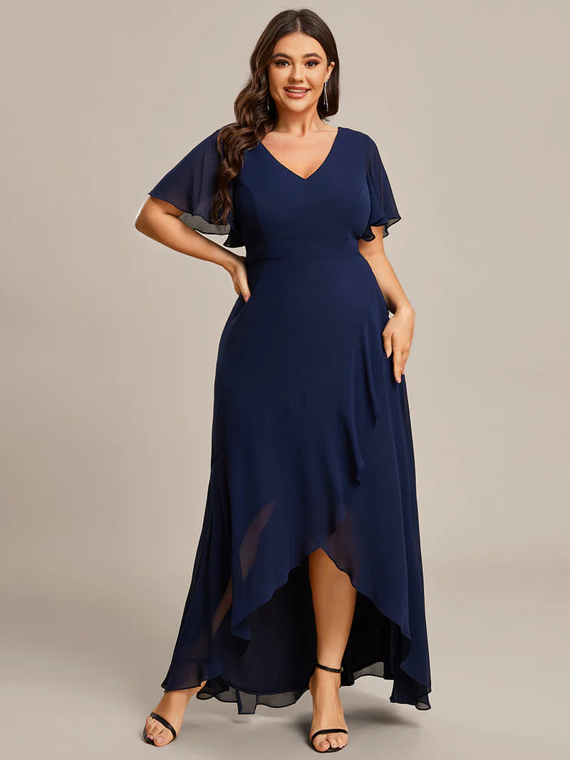 Navy blue plus sized bridesmaid dress with high low ruffle and chiffon.