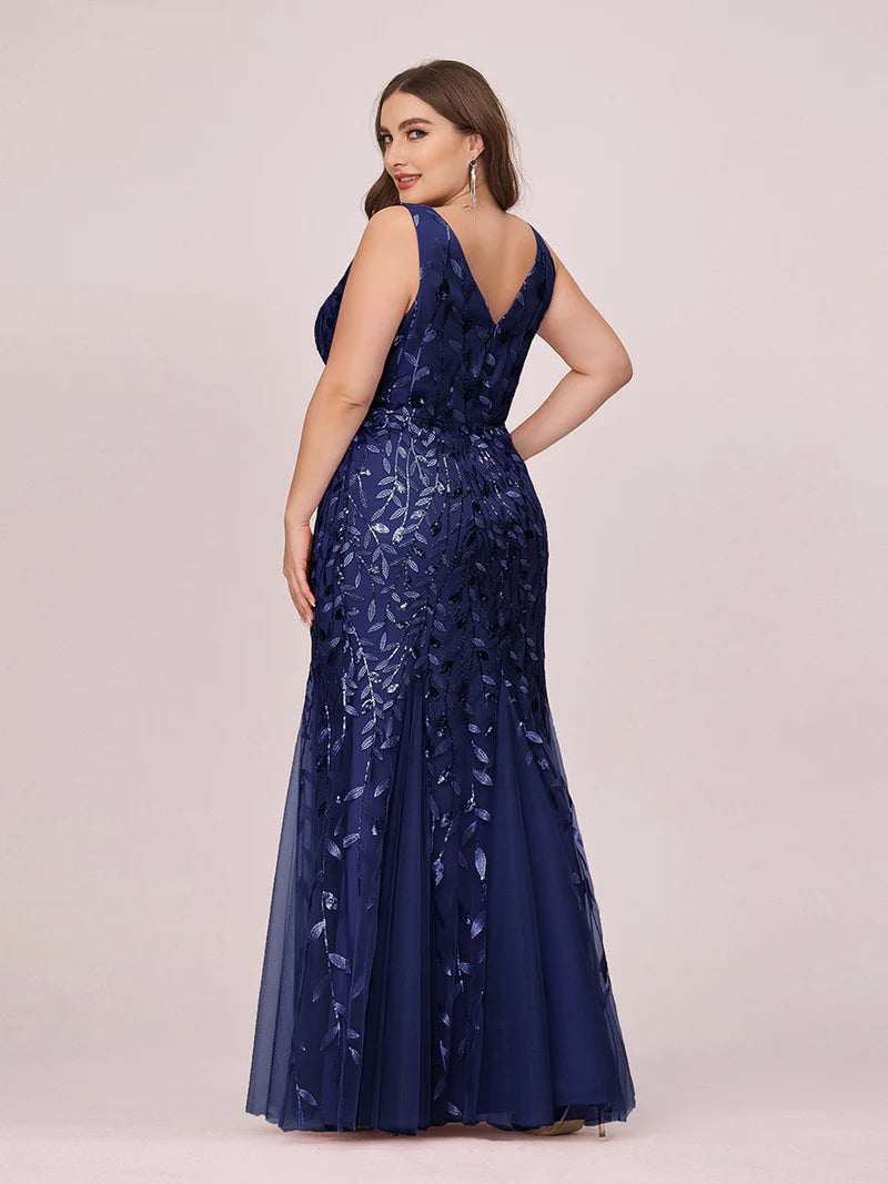 Navy blue plus sized dress with fishtail and sequin.