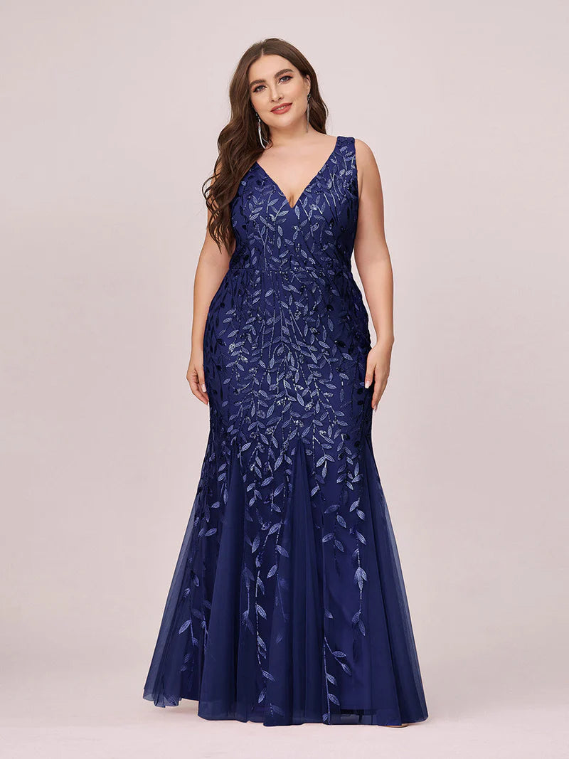 Navy blue plus sized dress with fishtail and sequin.