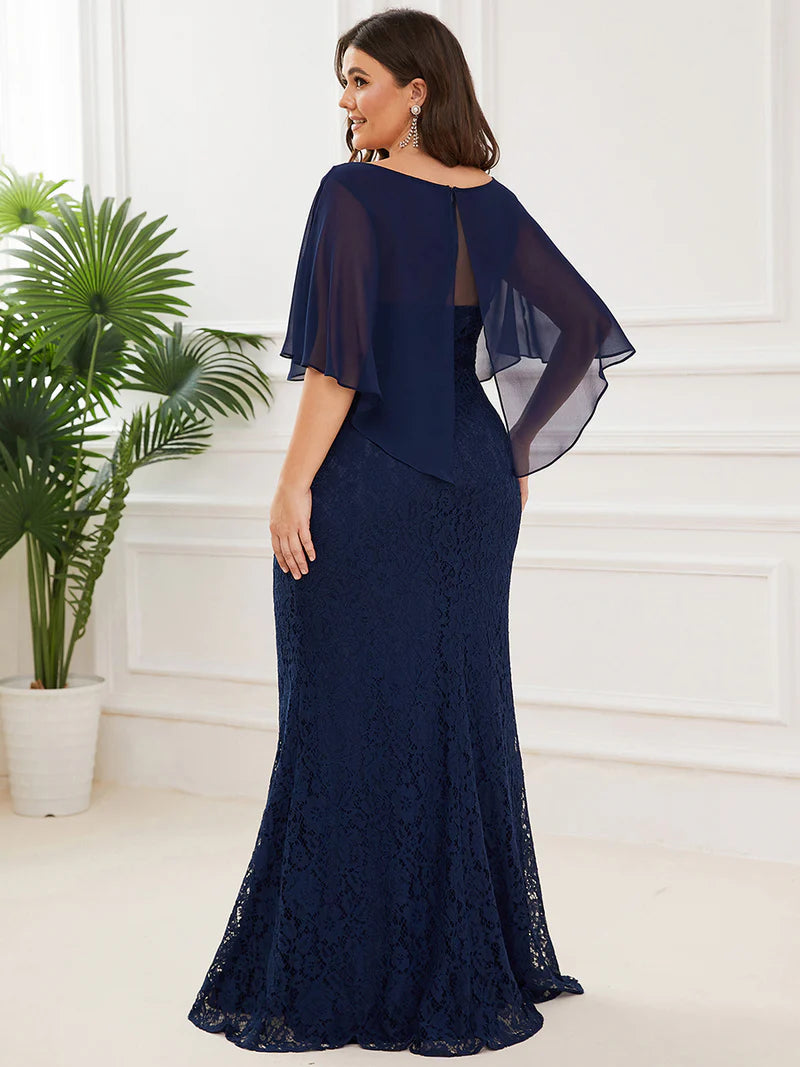 Navy blue Mother of the Bride dress in plus size with fishtail finish, lace with chiffon cape ruffle sleeves. Graceful Elegance bridal shop services Logan, Brisbane, Gold Coast, Scenic Rim.