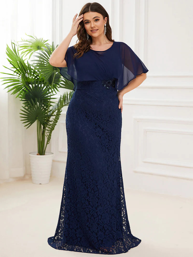 Navy blue Mother of the Bride dress in plus size with fishtail finish, lace with chiffon cape ruffle sleeves. Graceful Elegance bridal shop services Logan, Brisbane, Gold Coast, Scenic Rim.