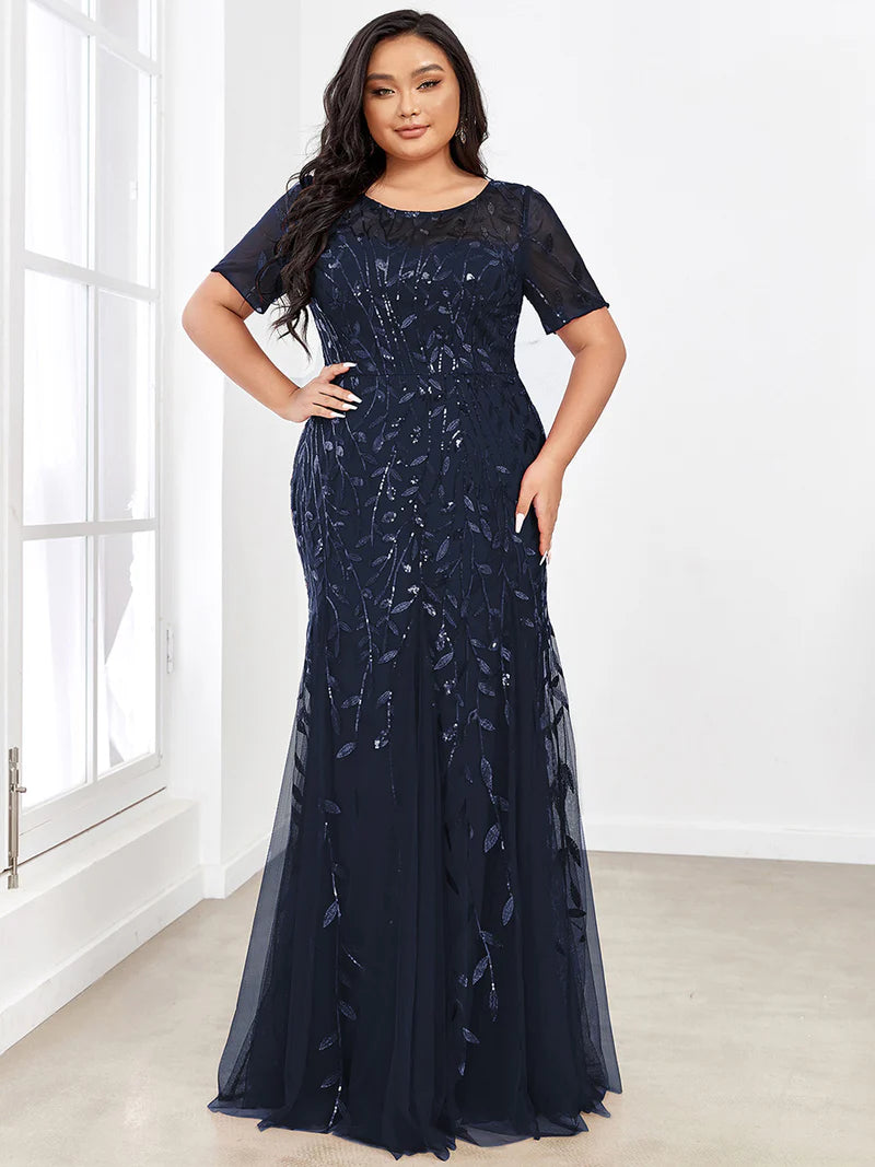 Navy blue Plus Size Mother of the bride or formal dress, short sleeve with tulle, lace and sequin detailing.