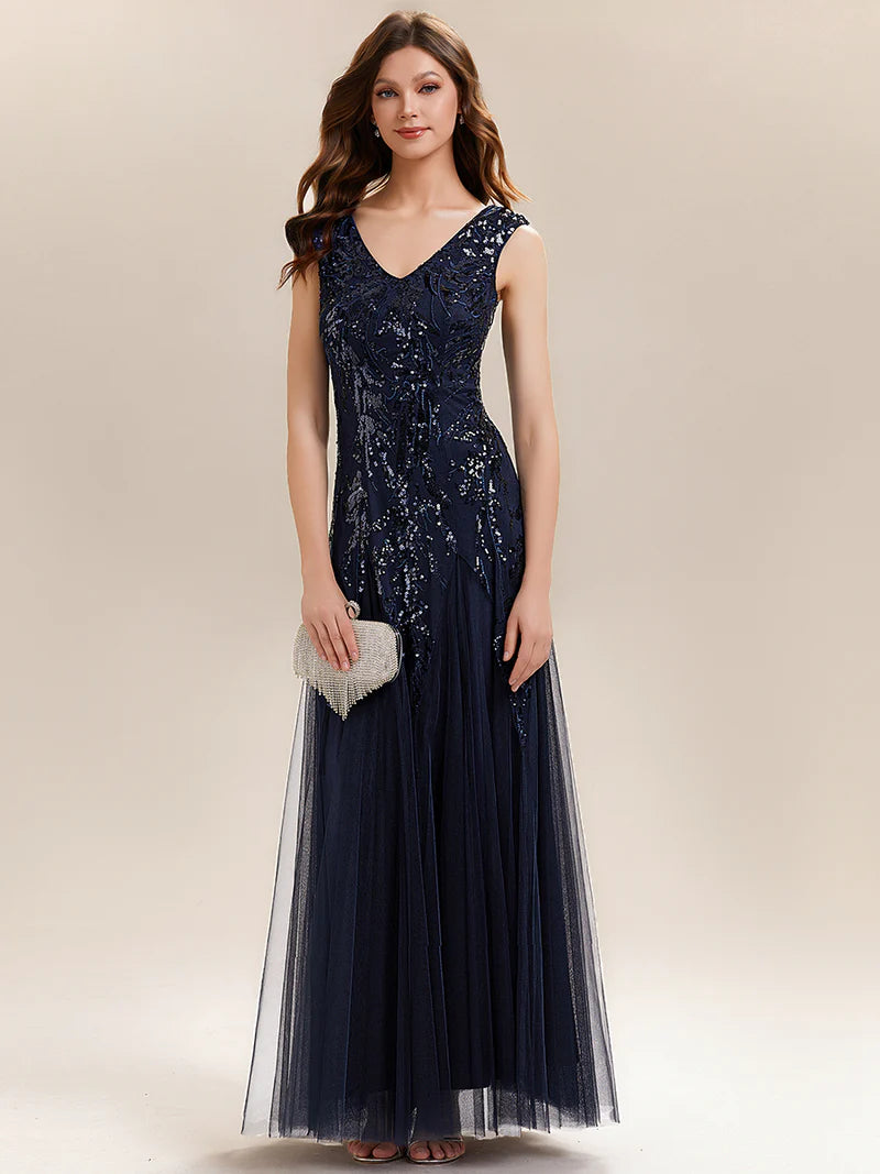 Navy blue sequin and tulle mother of the bride dress with short sleeve.