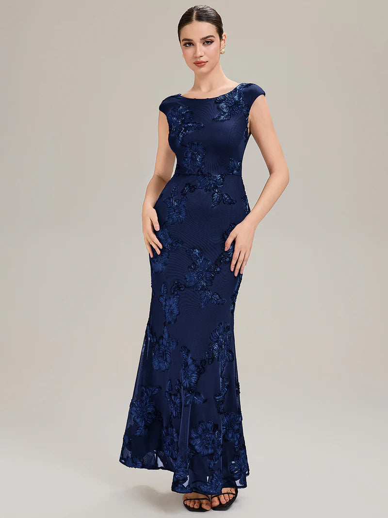 Navy Blue mother of the bride dress with ribbon detail and sheath mermaid style.