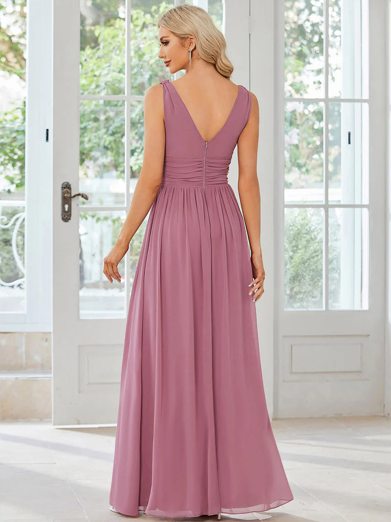 Orchid bridesmaid dress with double v-neck and chiffon.