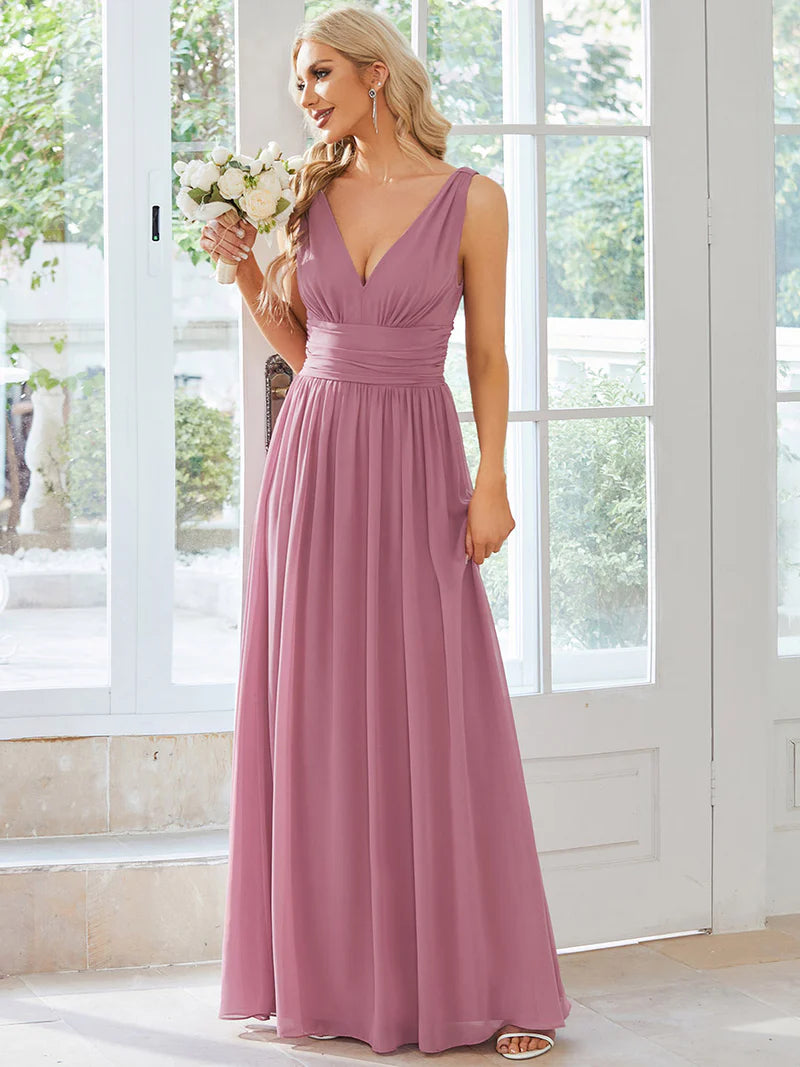 Orchid bridesmaid dress with double v-neck and chiffon.