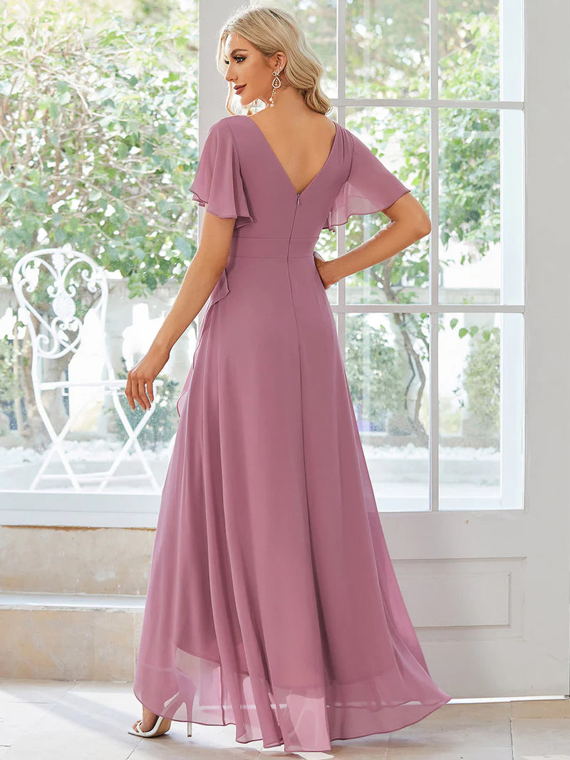 Orchid bridesmaid dress with high low ruffle and chiffon.