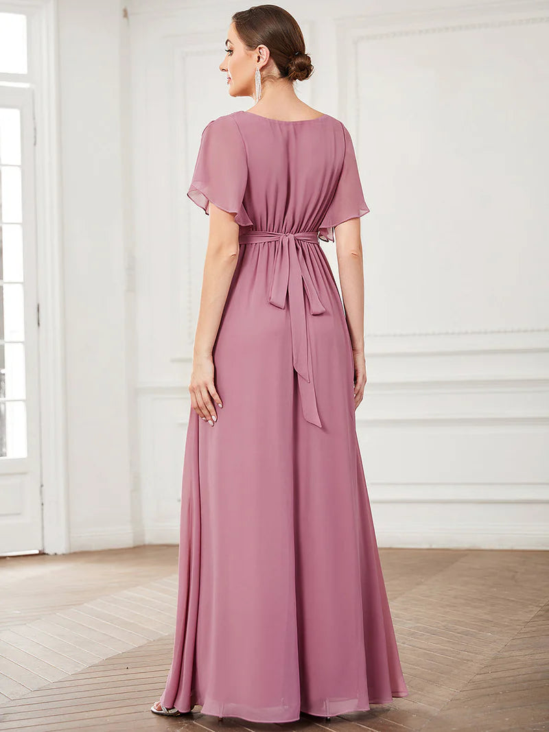 Orchid bridesmaid dress with v-neck and a-line.