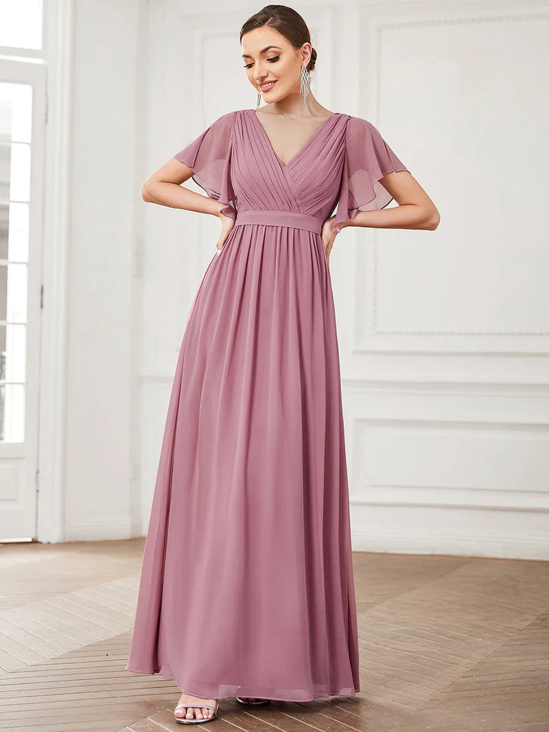Orchid bridesmaid dress with v-neck and a-line.