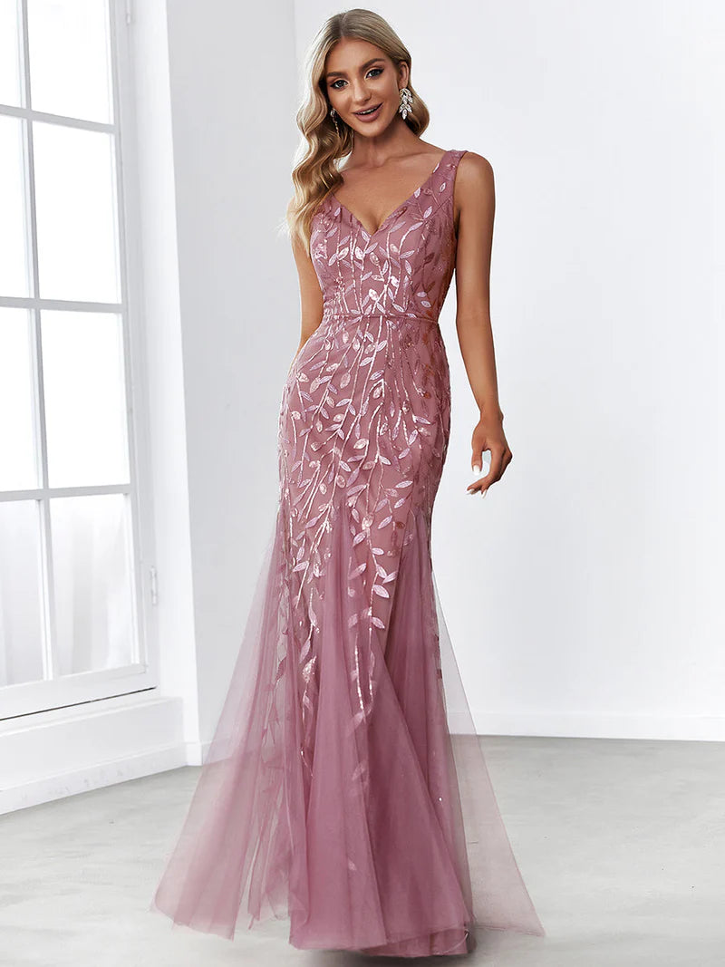 Orchid formal dress with fishtail and sequins.