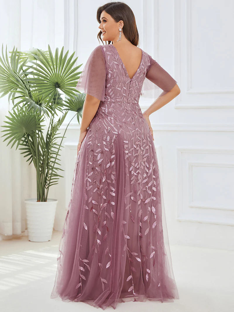 Orchid Pink plus size mother of the bride dress with short sleeves and flowing tulle.