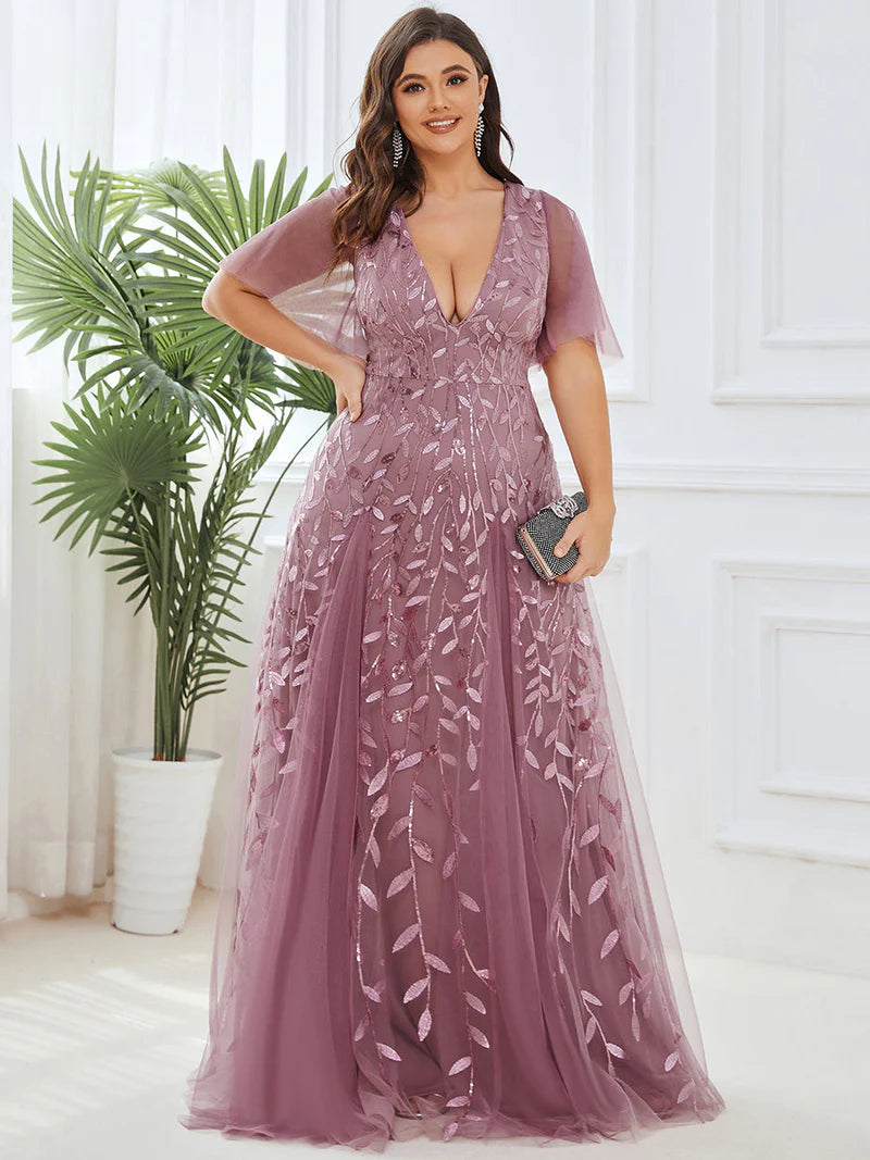 Orchid Pink plus size mother of the bride dress with short sleeves and flowing tulle.