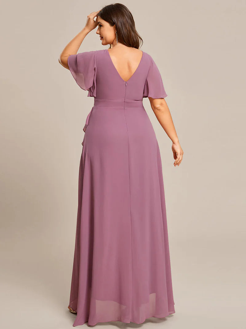 Orchid plus sized bridesmaid dress with high low ruffle and chiffon.