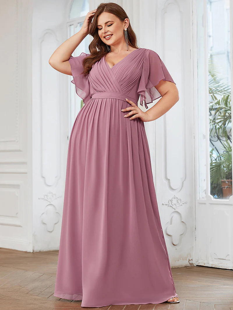 Orchid plus sized bridesmaid dress with v-neck and a-line.