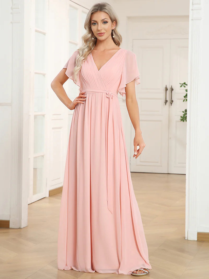 Pink bridesmaid dress with v-neck and a-line.