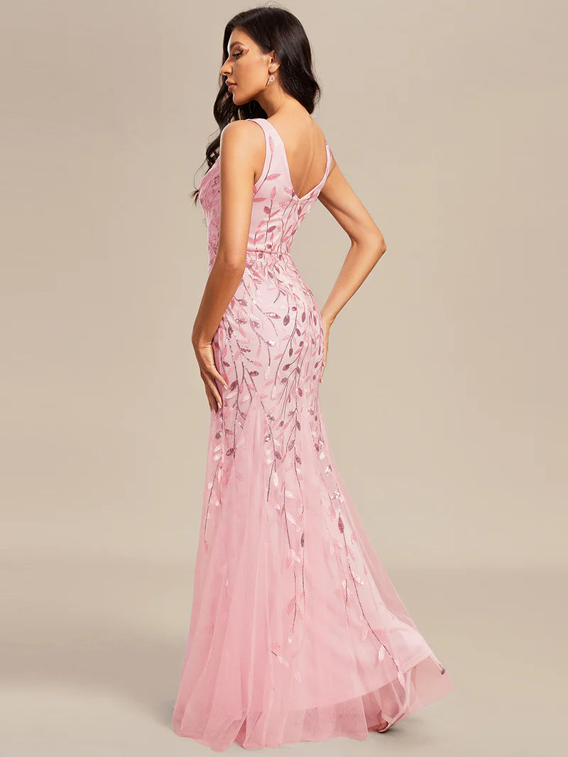 Pink formal dress with fishtail and sequins.