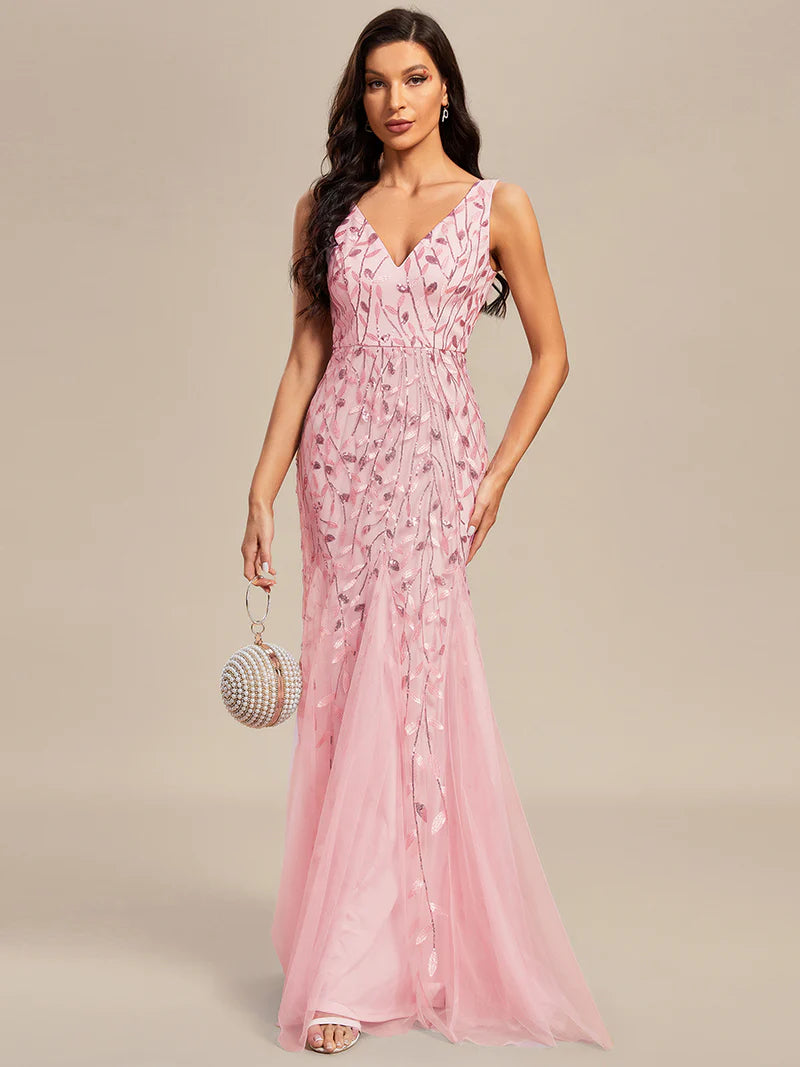 Pink formal dress with fishtail and sequins.