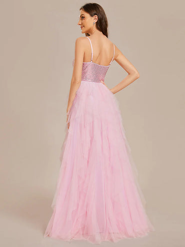 Pink formal layered tulle dress with sequin top and spaghetti straps.