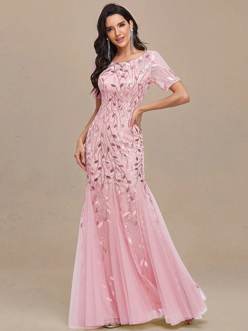 Pink Mother of the bride or formal dress, short sleeve with tulle, lace and sequin detailing.