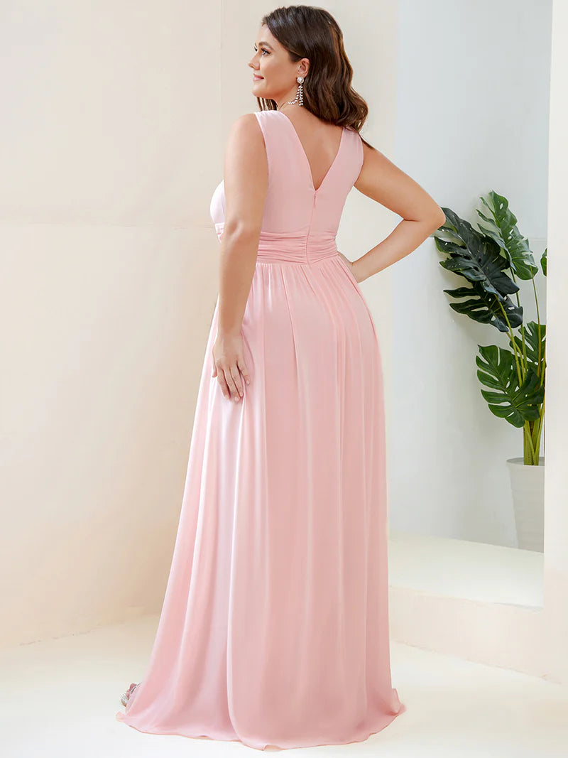 Pink plus sized bridesmaid dress with double v-neck and chiffon.