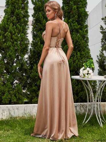 Rose gold formal dress with corset front and lace up back.