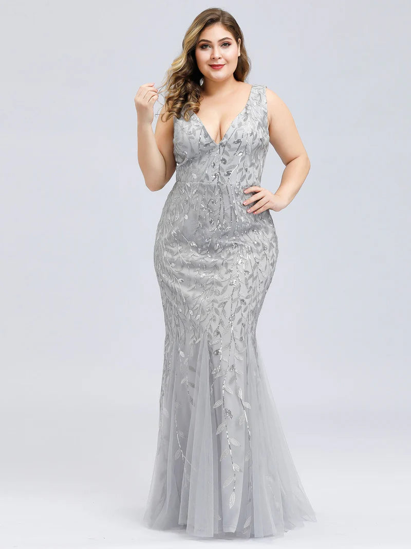 Silver plus size formal dress with sequins and tulle.